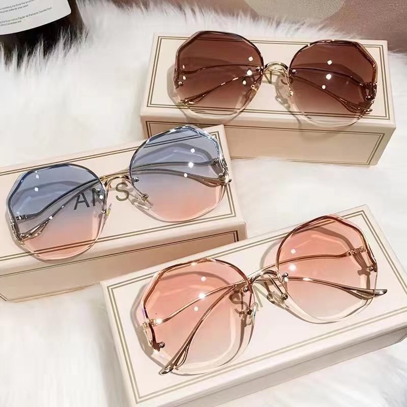 Fashionable European and American frameless sunglasses with trim, anti-ultraviolet, street-style sun glasses for women